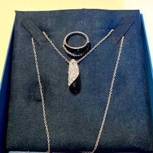 Silver and black rhinestone necklace and ring.